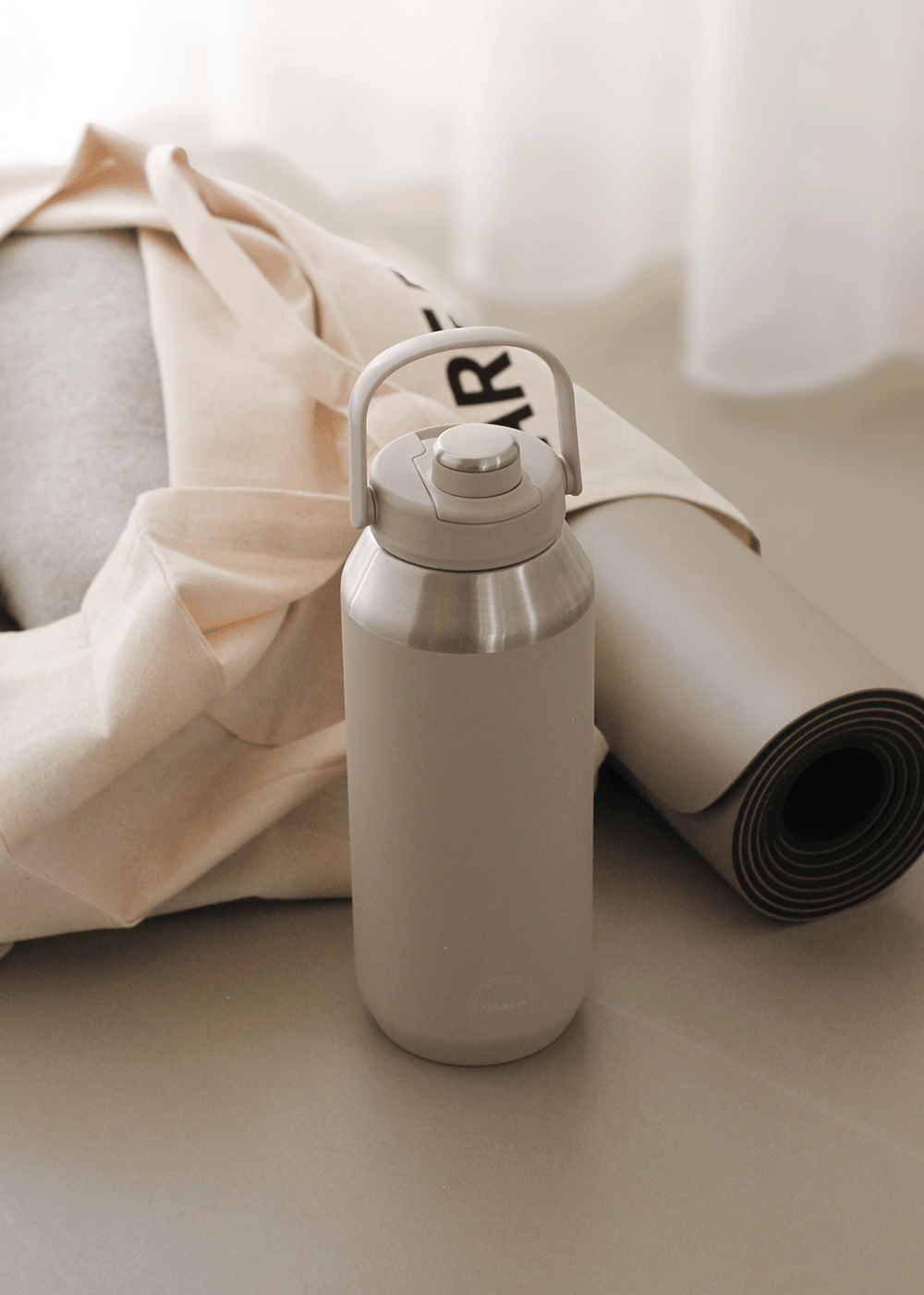 AYA&IDA Sports Bottle 950 ml Cream Beige drikkedunk i rustfrit stål