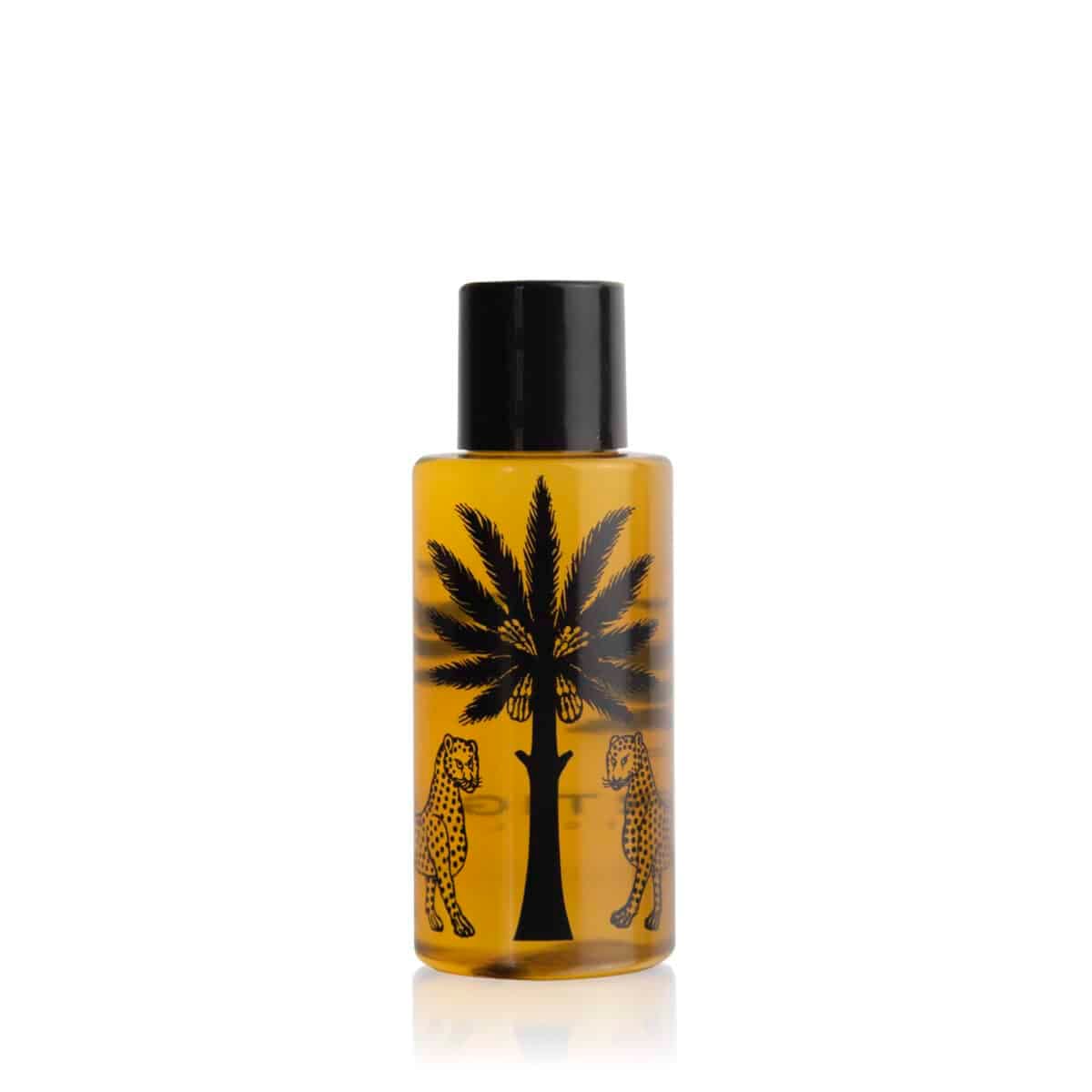Ambra Nera shower gel rejsestørrelse ravfarvet flaske med palme Ortigia