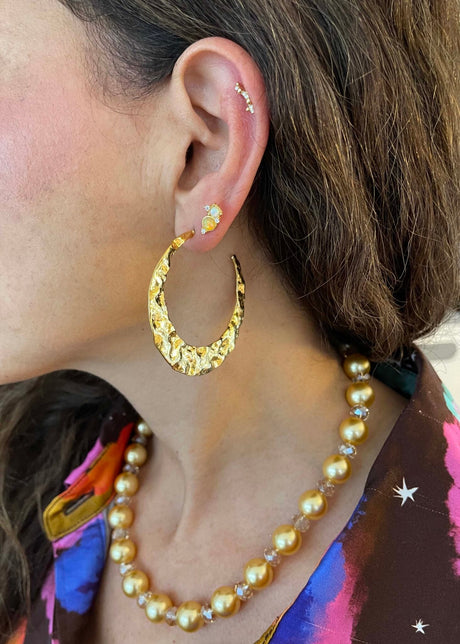 Nuni Copenhagen Paula øreringe Gold hoops 50 mm med formet design