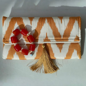 Gul silke clutch ikat print